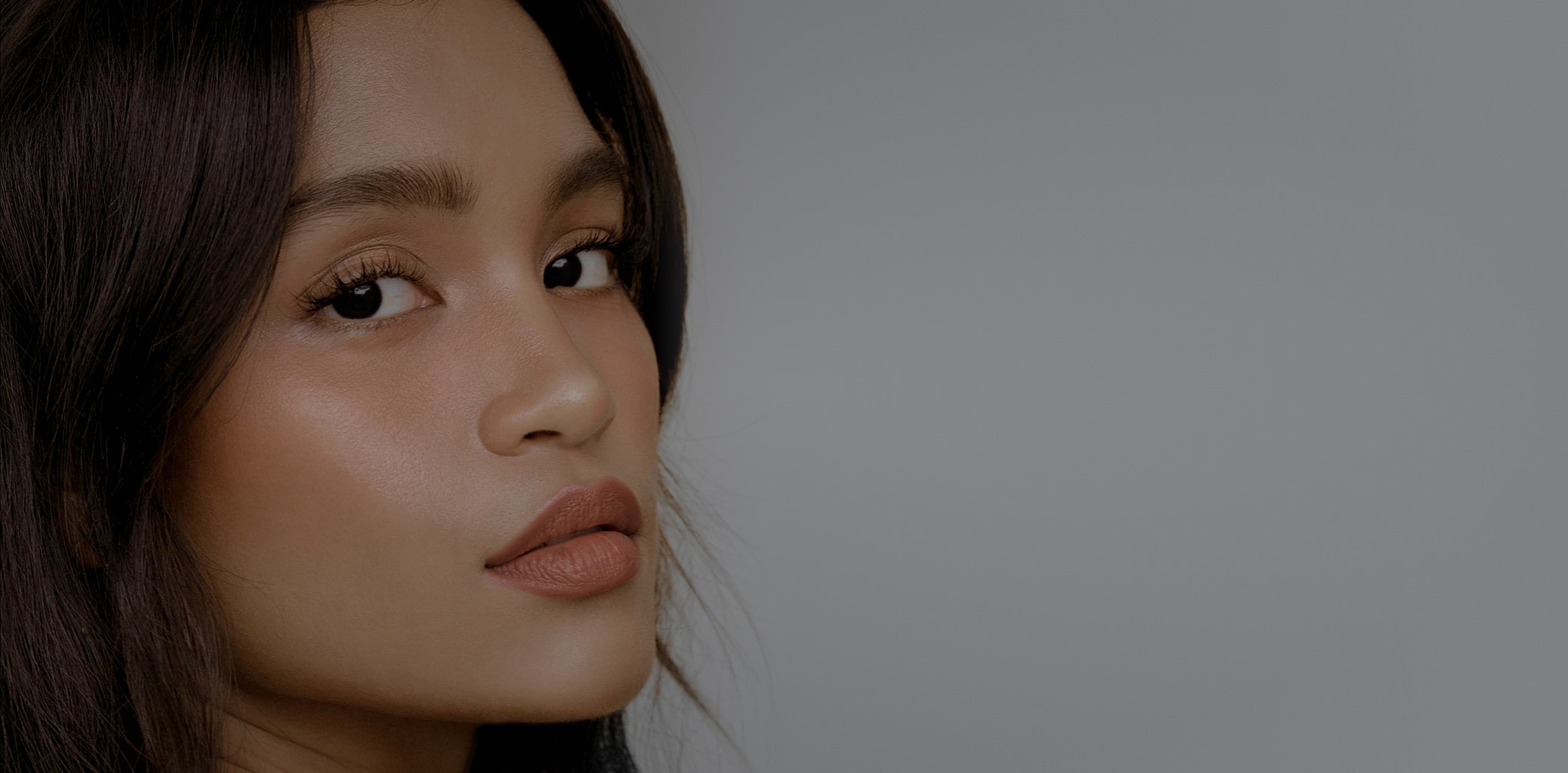 Close-up of a woman with natural makeup.