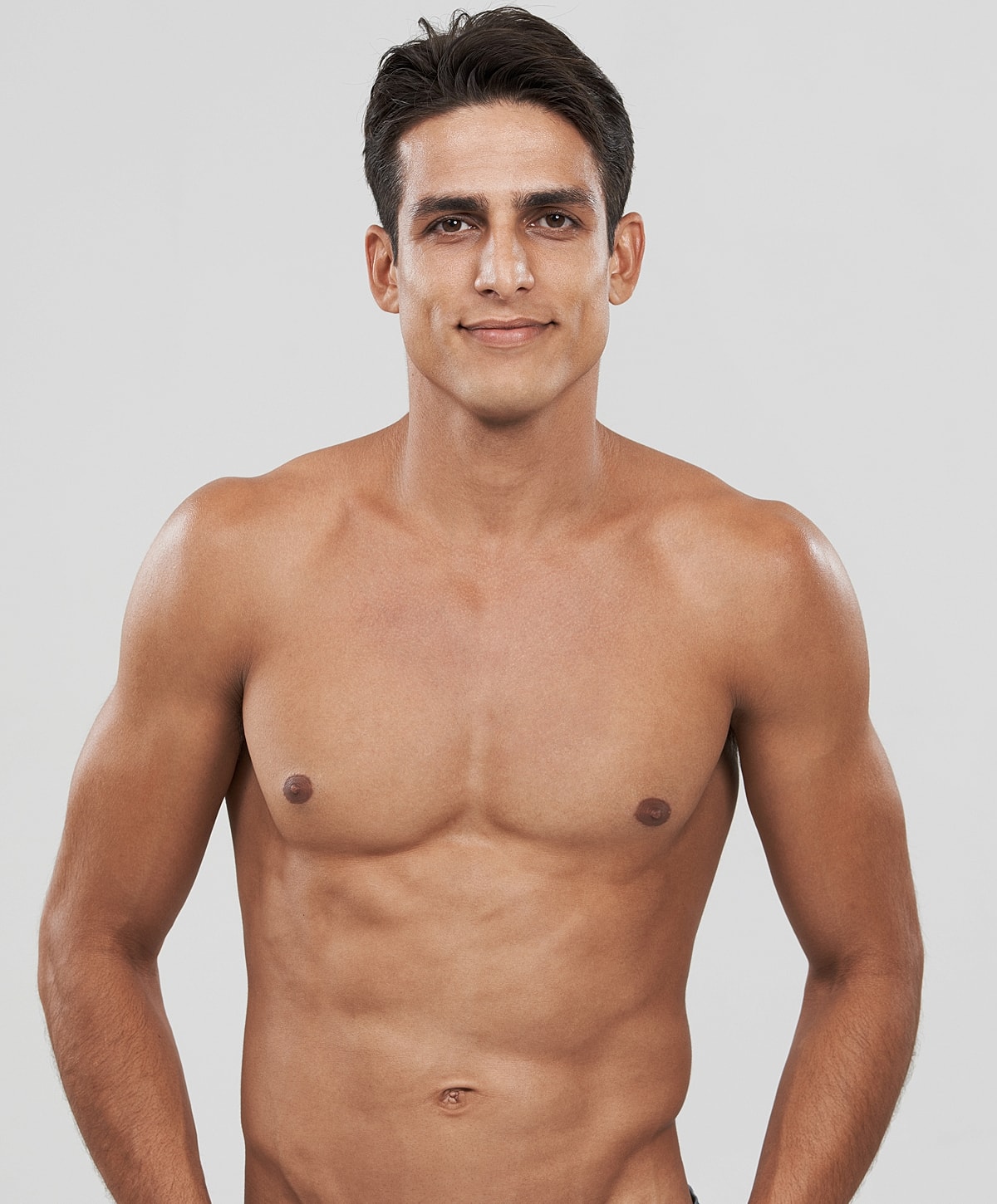 Gainesville, FL gynecomastia Surgery model smiling against a plain background.