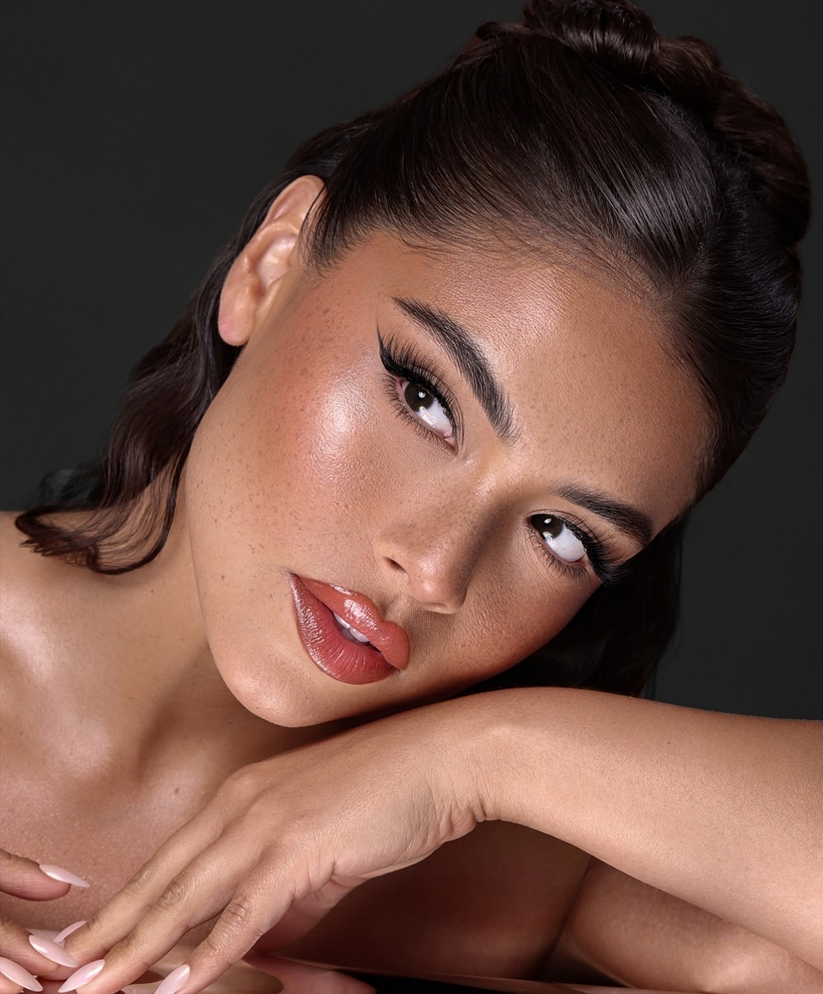 Gainesville, FL dermal fillers model with flawless makeup.