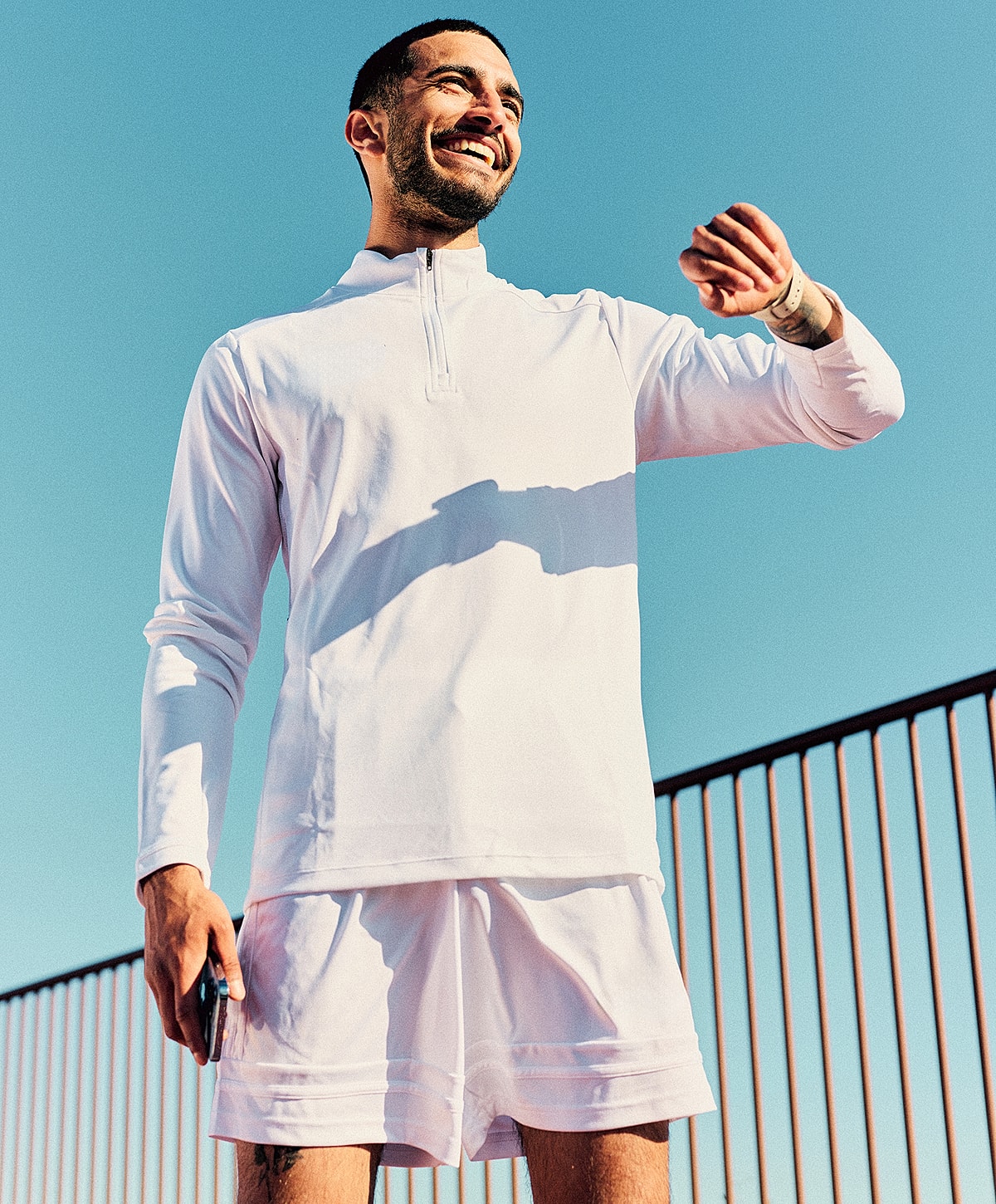 Gainesville, FL peptide therapy model wearing white.