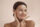 woman holding her face