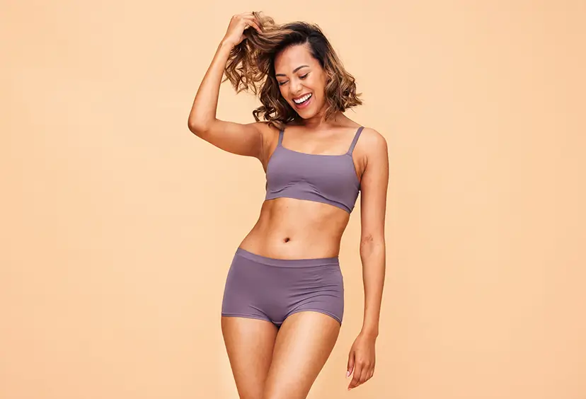 young woman wearing a matching lingerie set